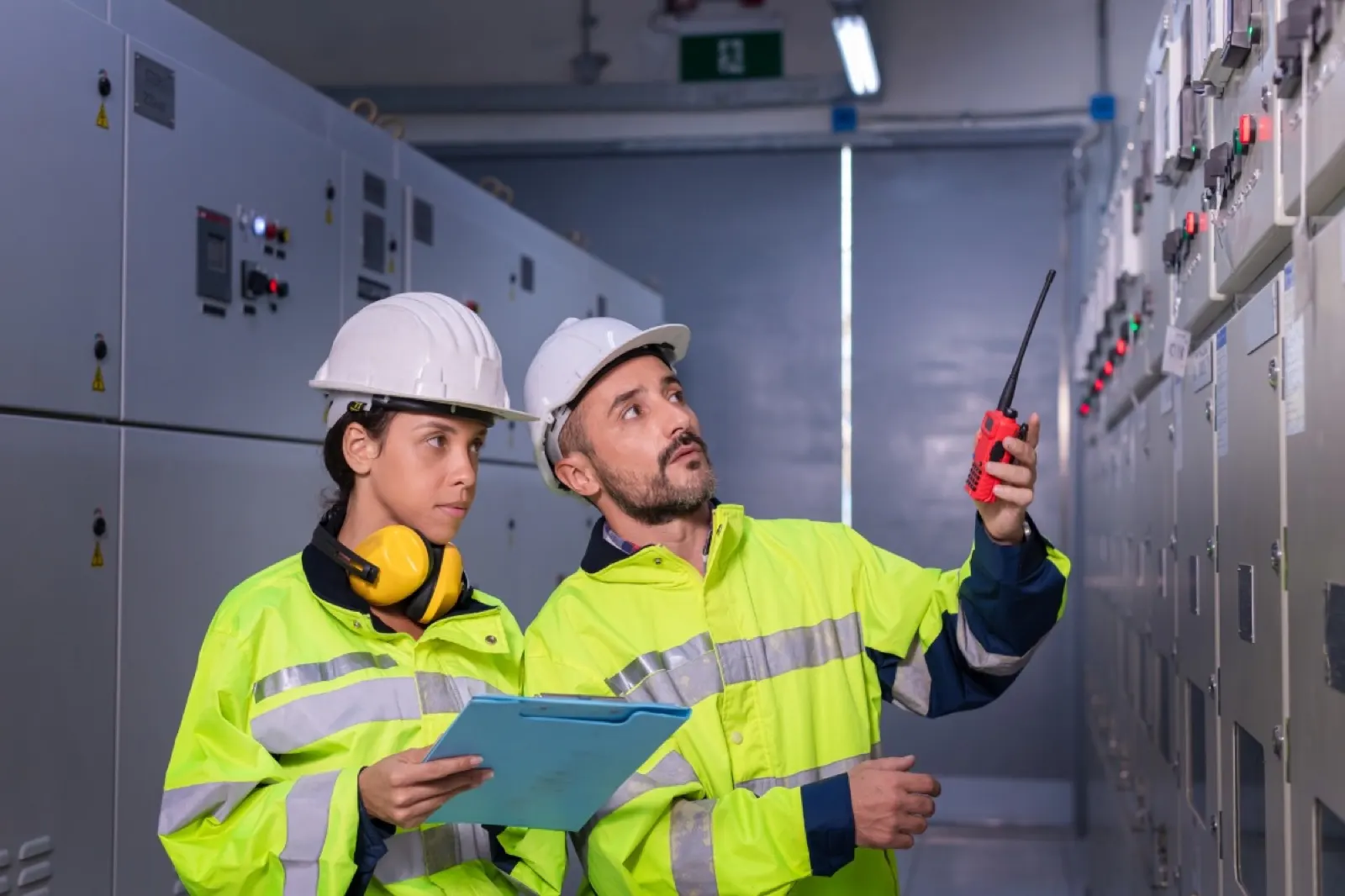 Electrician testing circuits during an EICR